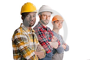 group of multiethnic construction workers in row looking