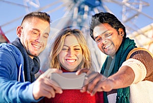 Group of multiracial best friends taking a selfie