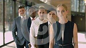 Group of multiracial business team standing in a row in the lobby