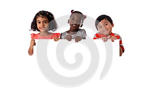 Group of multiracial kids portrait with white board.Isolated photo