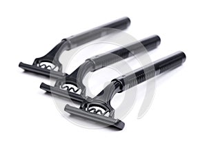 Group of new black plastic disposable shavers