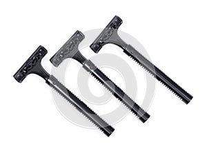 Group of new black plastic disposable shavers
