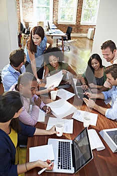 Group Of Office Workers Meeting To Discuss Ideas