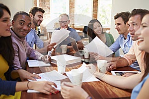 Group Of Office Workers Meeting To Discuss Ideas