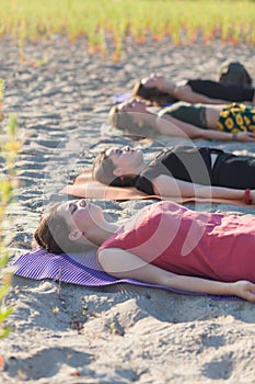group outdoor yoga meditation class