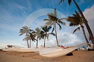 Group of outrigger conoes on the beach