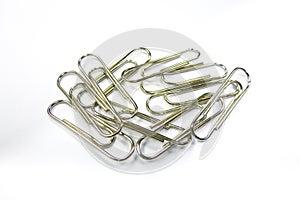 Group of paper clips on a white background.