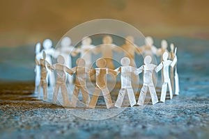 A group of people standing in a circle. Generative AI