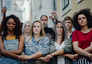 Group of people activists protesting on streets, women march and demonstration concept.