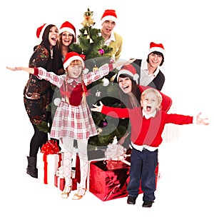 Group people children in santa hat, christmas tree