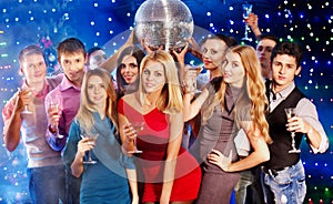 Group people dancing at party.