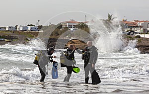 A group of people in a diving suit