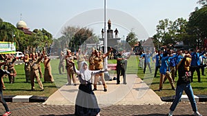 A group of people do a flashmob of traditional Babalu dance