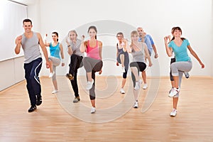 Group of people doing aerobics exercises