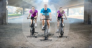 Group of people doing spinning on cycle bike