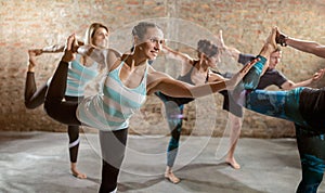 Group of people doing stretching exercise