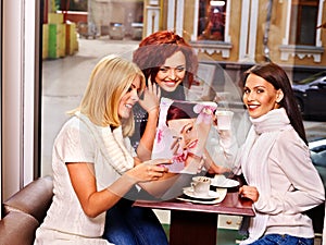 Group people drinking coffee at cafeteria.