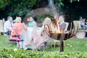 Group of people enjoying a garden party