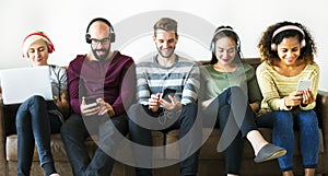 Group of people enjoying music streaming