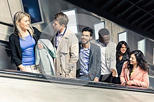 Group of people on the escalator