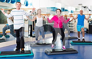 Group of people exercising in a fitness club