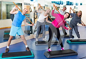 Group of people exercising in a fitness club