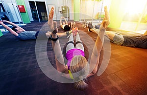 Group of people exercising in gym