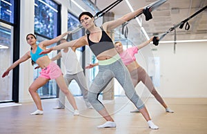 Group of people exercising with removers