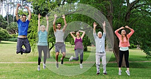 Group of people exercising together in the park
