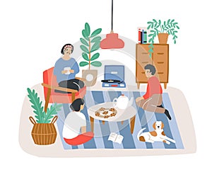 Group of people or friends sitting in comfy apartment furnished in Scandinavian hygge style and talking to each other photo