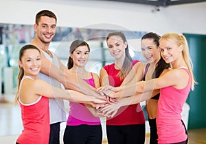 Group of people in the gym celebrating victory