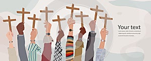 Group of people hands raised holding a crucifix. Christian worship. Faith and hope in Jesus Christ