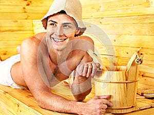 Group people in hat at sauna.