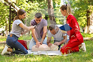 Group of people having first aid class