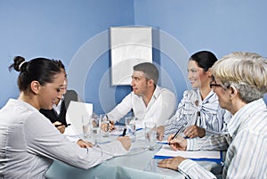 Group of people having fun at business meeting