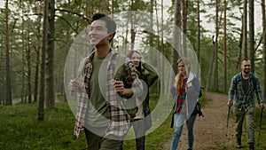 Group of people hiking in a forest