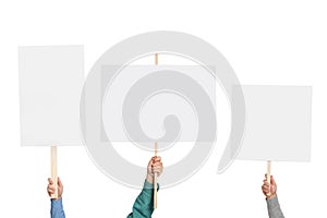 Group of people holding blank protest signs on white background, closeup