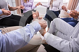 Group Of People Holding Hands