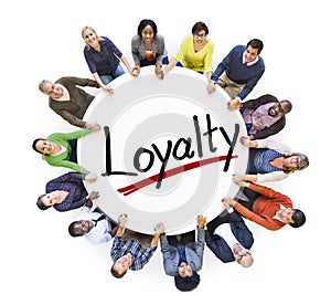 Group of People Holding Hands Around Letter Loyalty