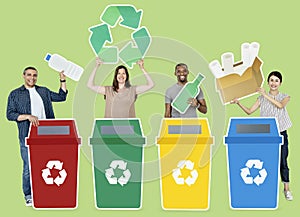 Group of people holding recycle icons