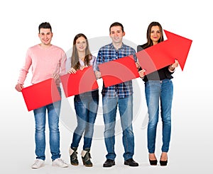 Group of people holding a red arrow