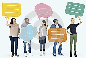 Group of people holding speech bubbles