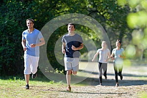 Group people jogging in park