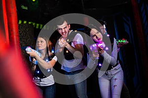 Group of people on laser tag arena