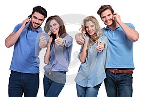 Group of people making the ok sign on the phone