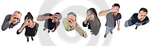 Group of people peeking with hand on face on white background