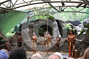 Group of people performing in the Tjapukai Aboriginal Cultural Park in Cairns, Australia