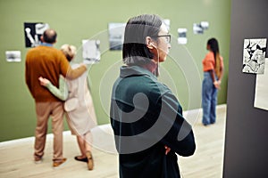 Group of People At Photography Exhibition