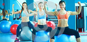 Group of people in a Pilates class at the gym