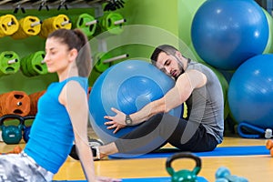 Group of people in a Pilates class at the gym